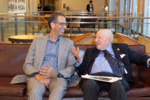 John Goldberg and Guido Calabresi chat casually.