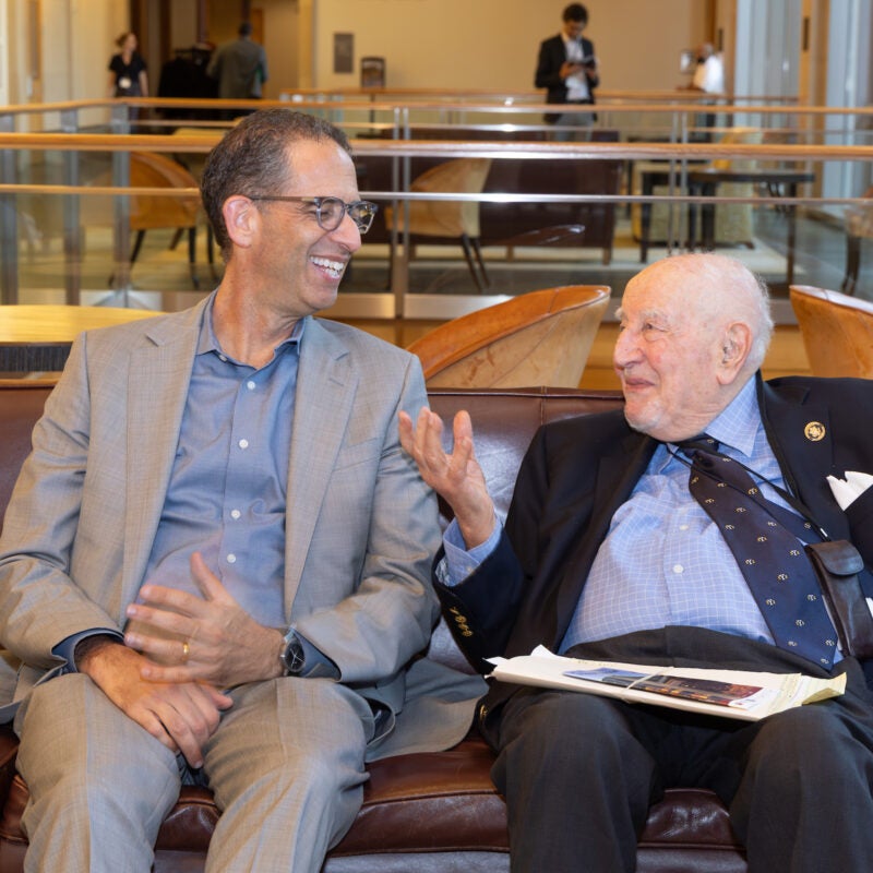 John Goldberg and Guido Calabresi chat casually.