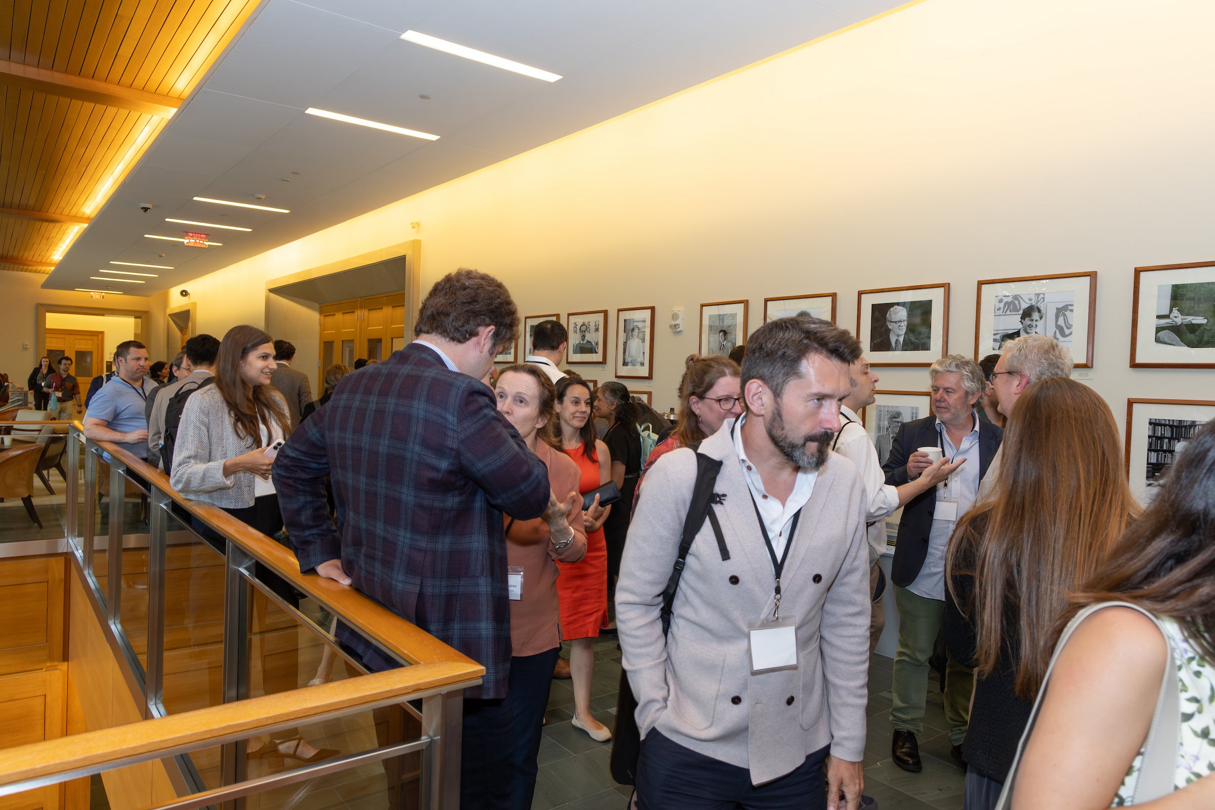 Obligations Conference attendees socialize during a break.