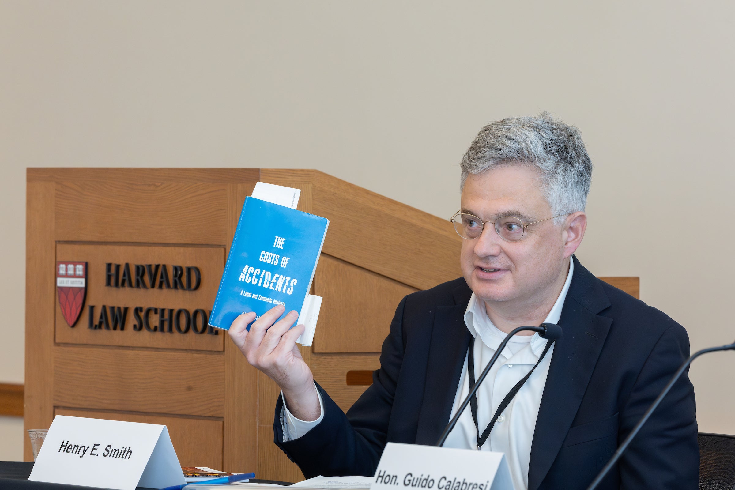Henry Smith holding up his copy of
