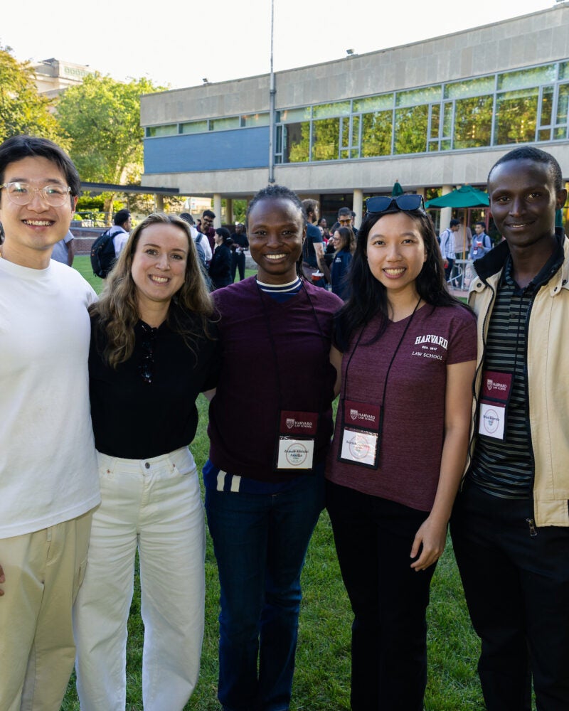 Five students pose for a photo.