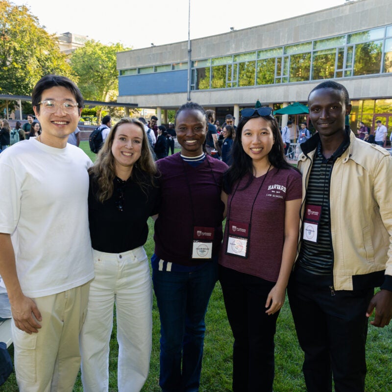 Five students pose for a photo.