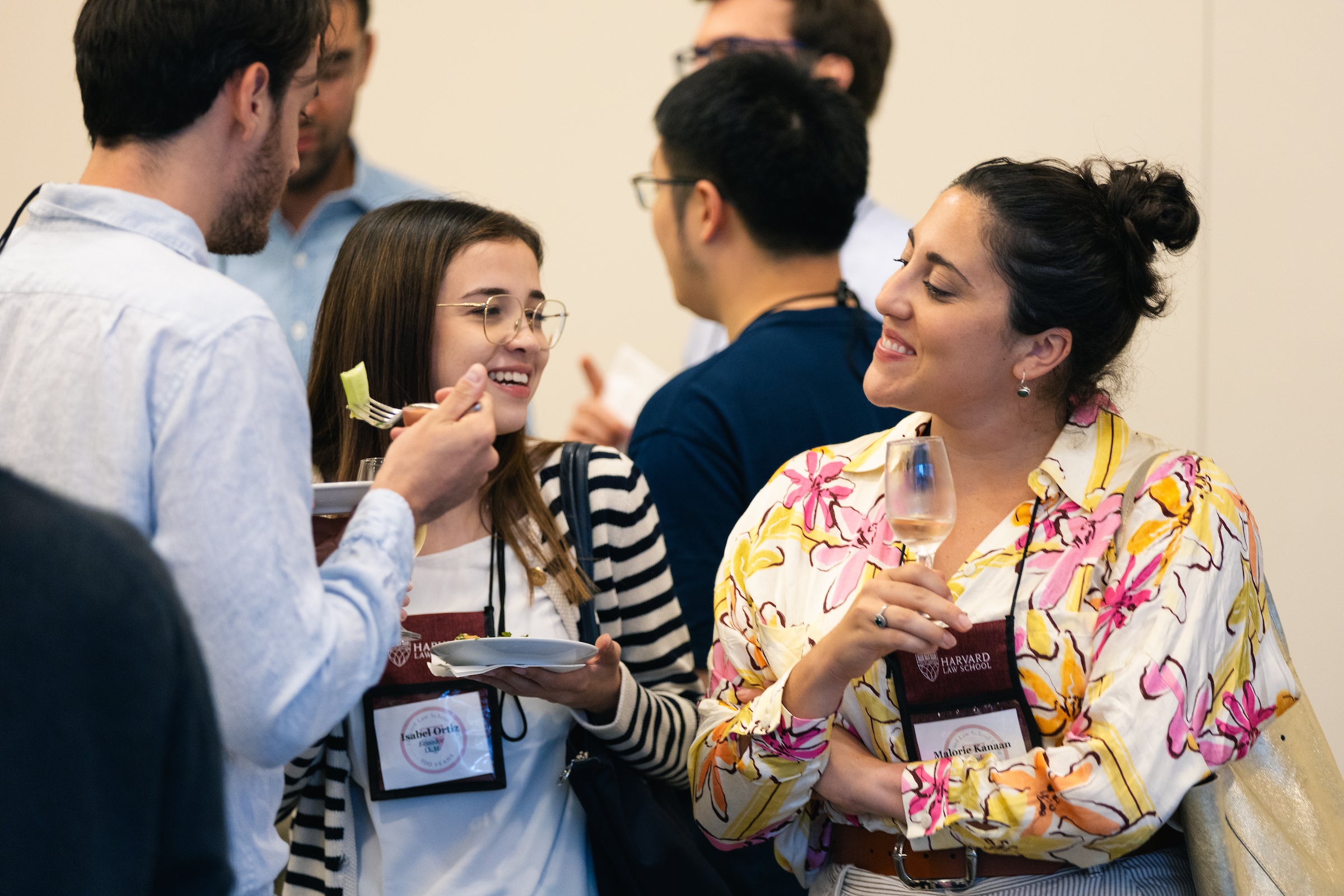 New students mingle at a reception.