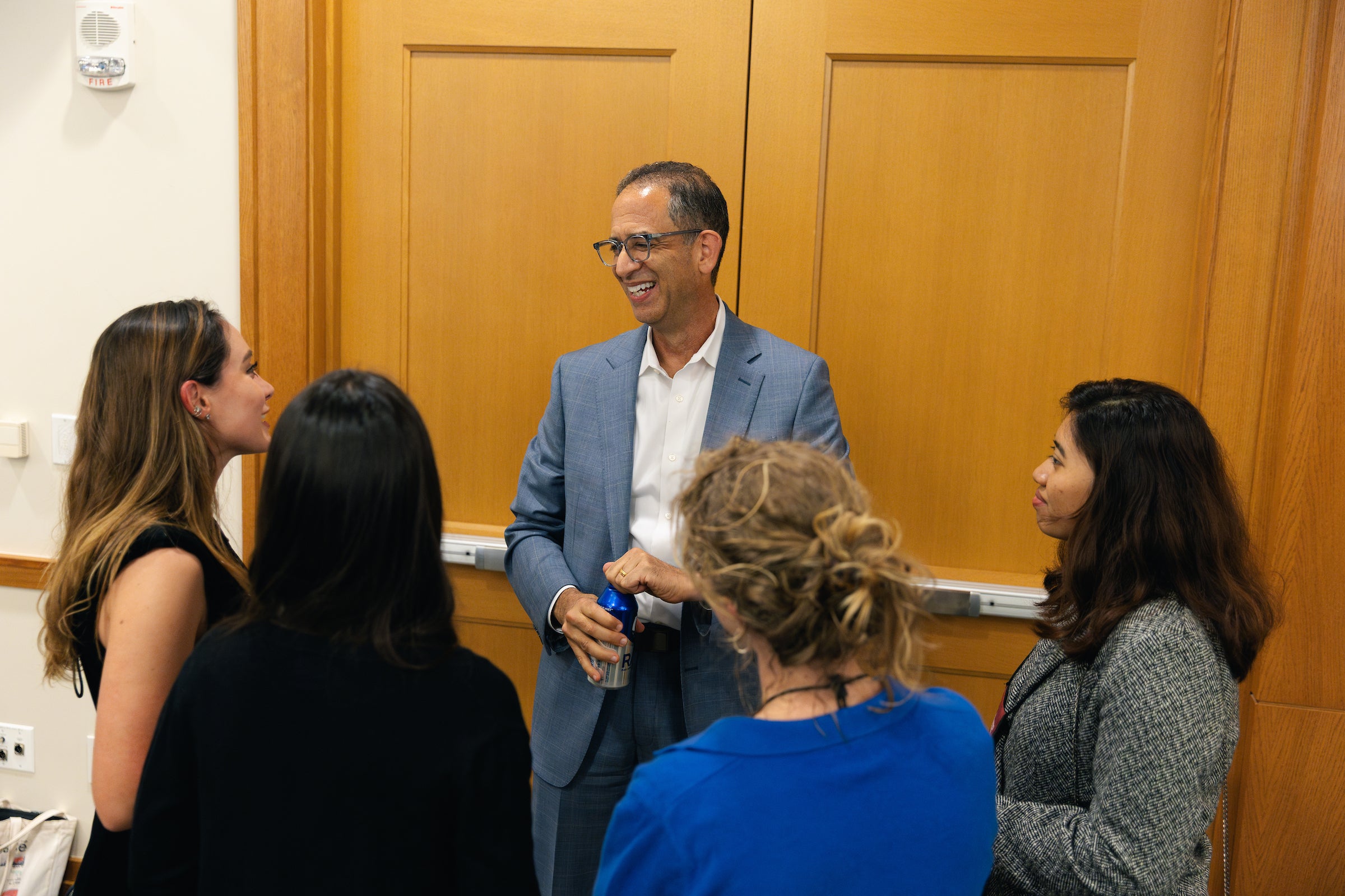 Dean John Goldberg speaks with LL.M. students at a welcome reception during orientation.