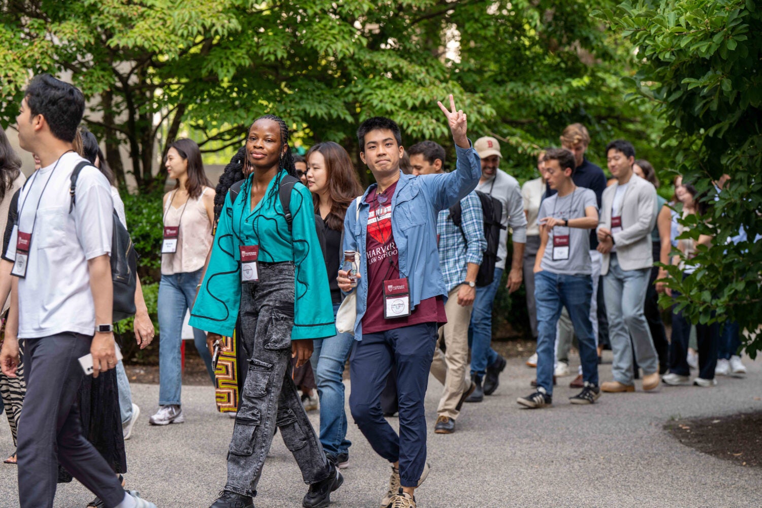 A group of students walking from campus to Sanders Theatre.