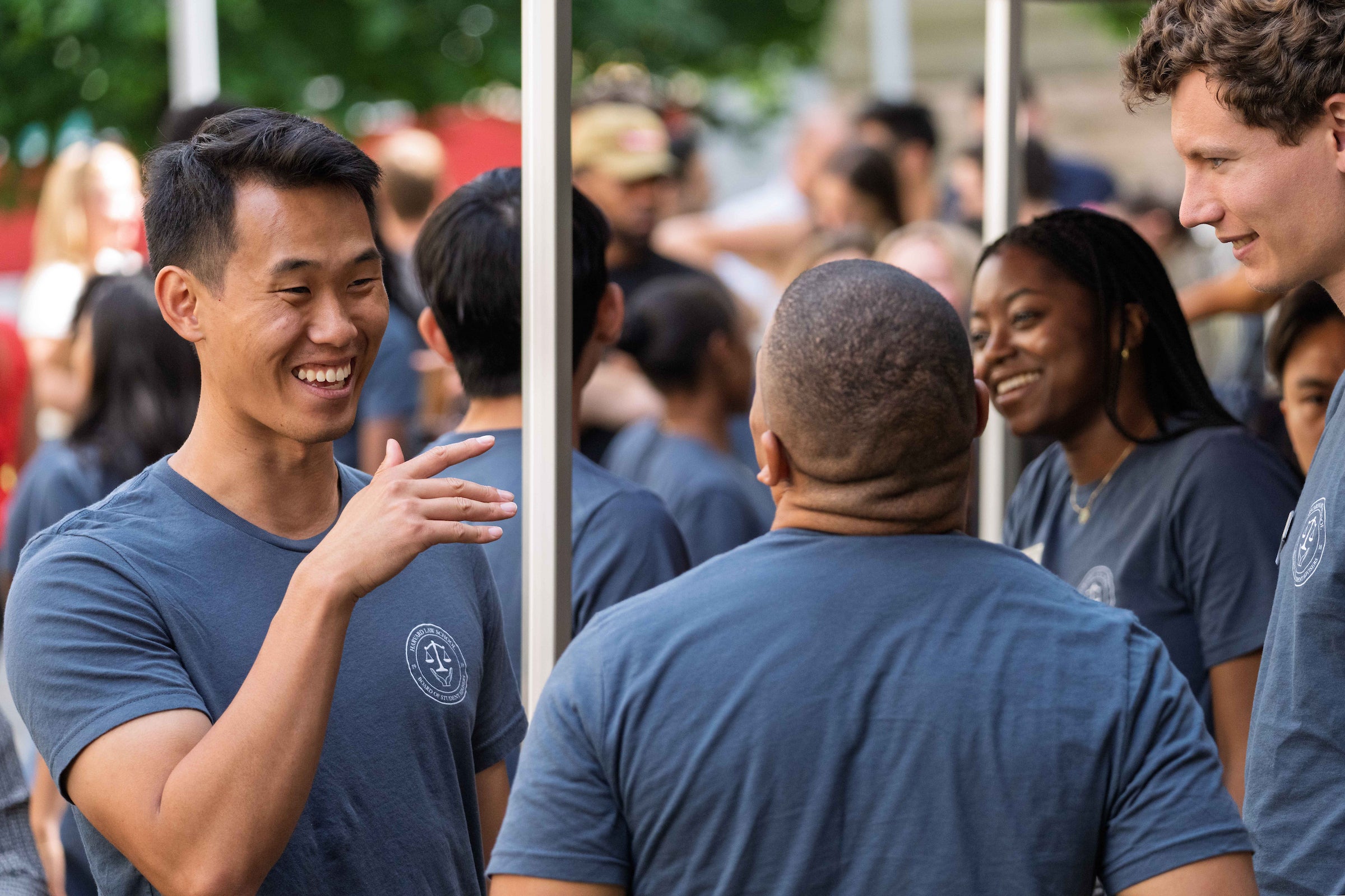Students enjoy a light moment on campus during orientation.