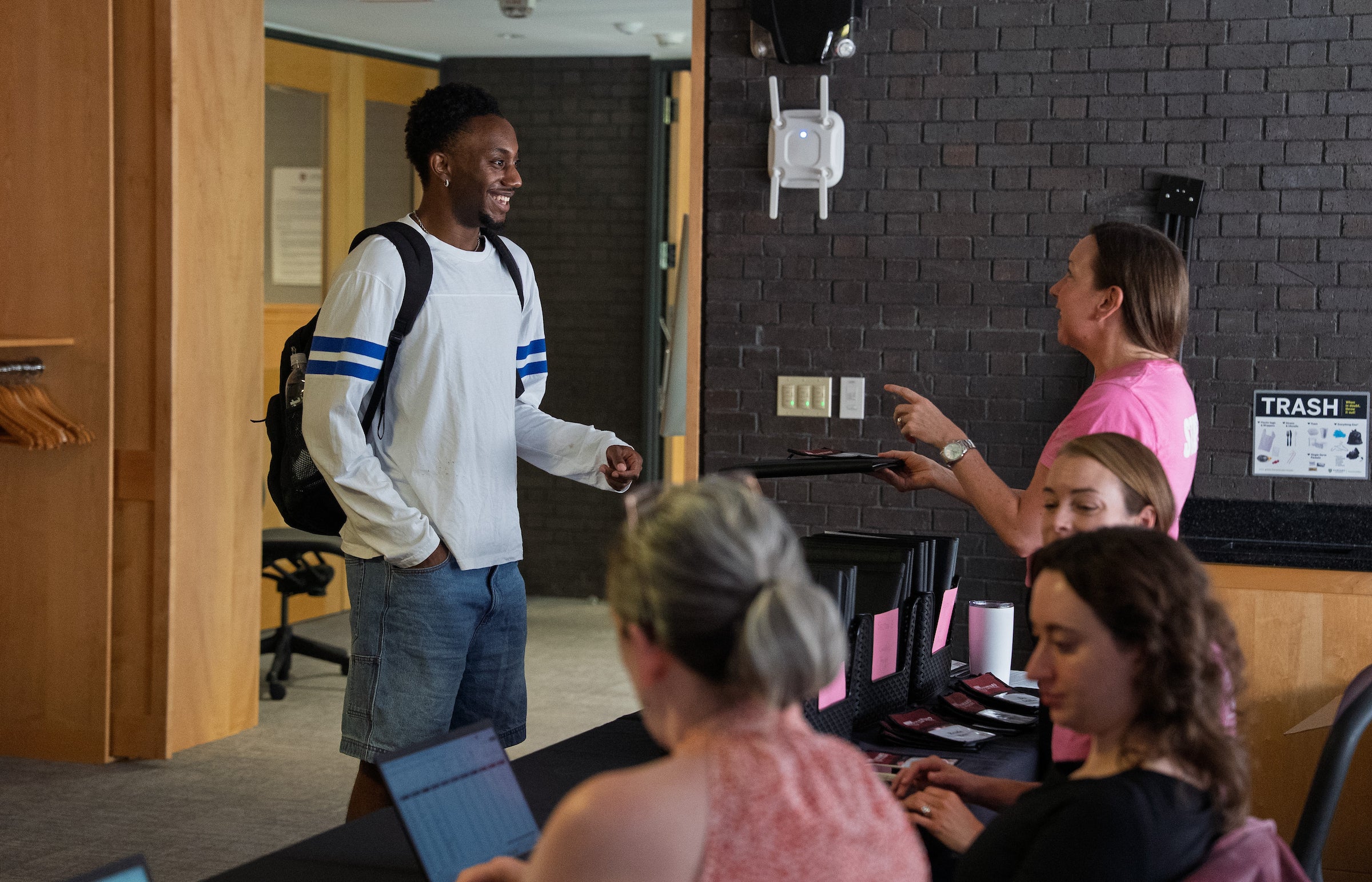 A student checks in at orientation.