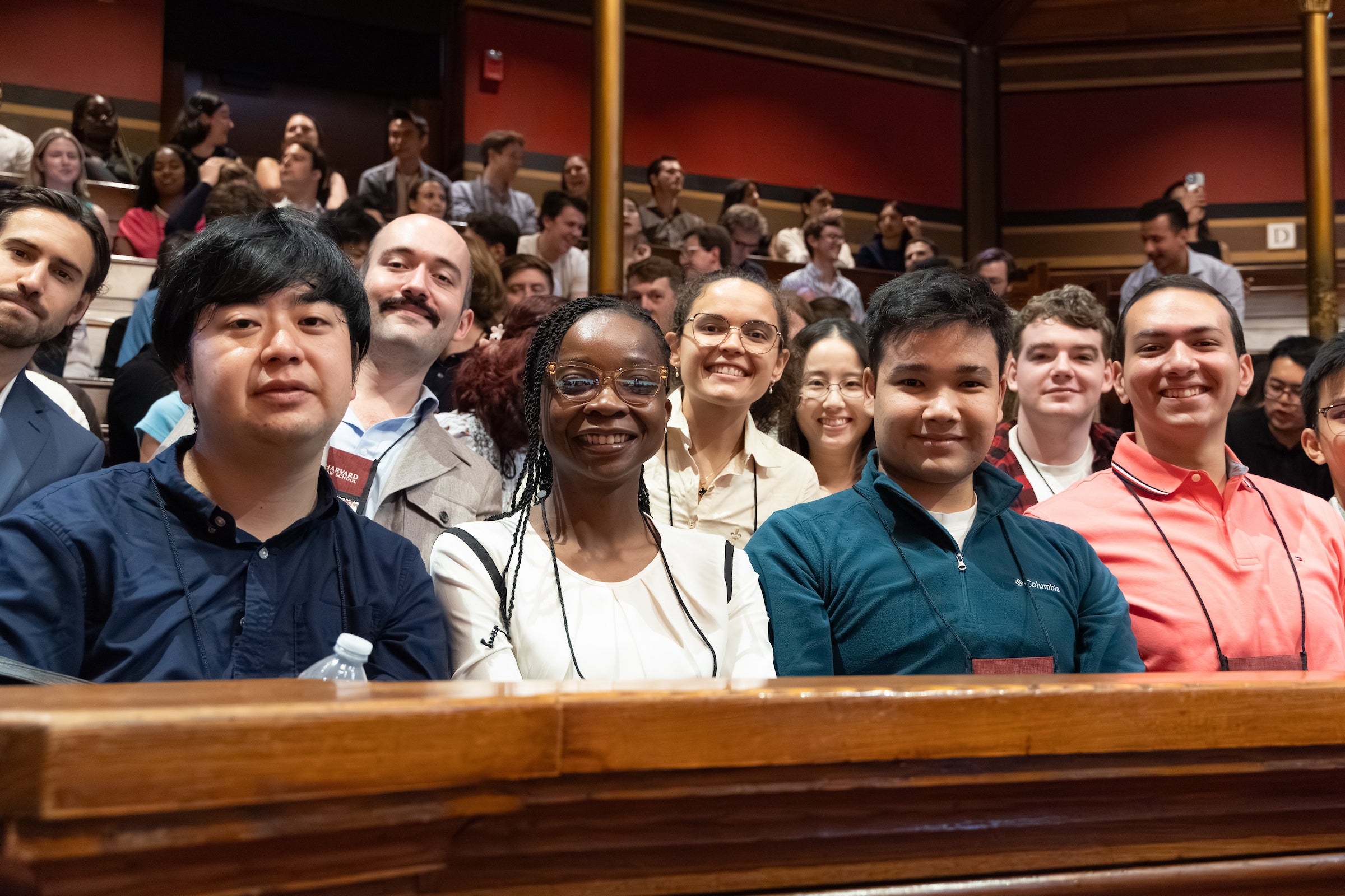 Students in the audience of the Sanders Theatre dean's welcome address.