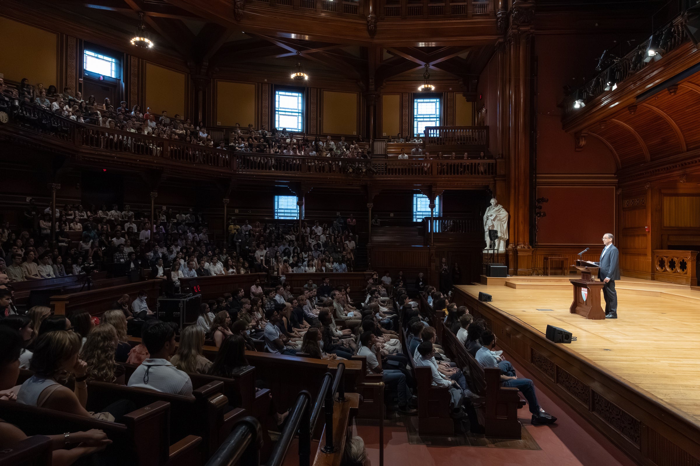 John Goldberg speaking to incoming students at Sanders Theatre.