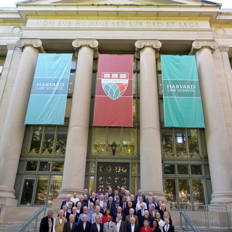 HLS Alumni on the steps of Langdell Hall.