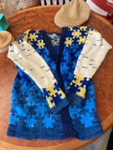 Hand-knitted sweater with puzzle-piece design