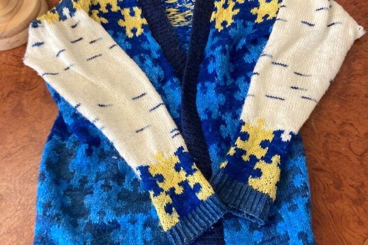 Hand-knitted sweater with puzzle-piece design