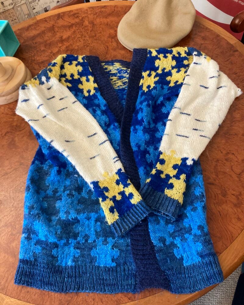 Hand-knitted sweater with puzzle-piece design