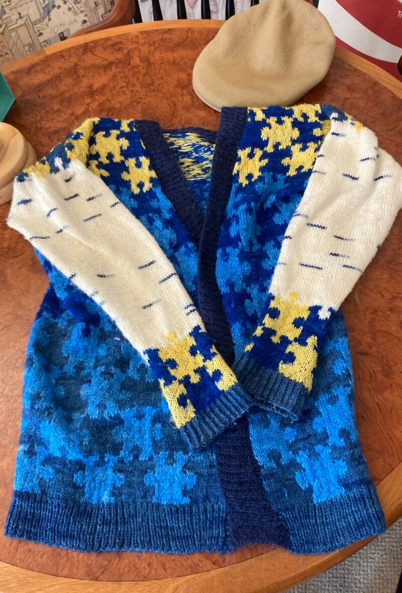 Hand-knitted sweater with puzzle-piece design