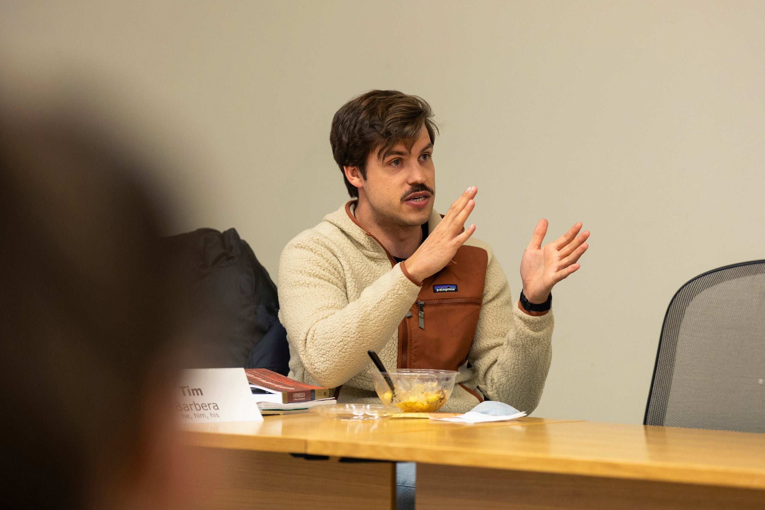 Student speaking in a classroom.