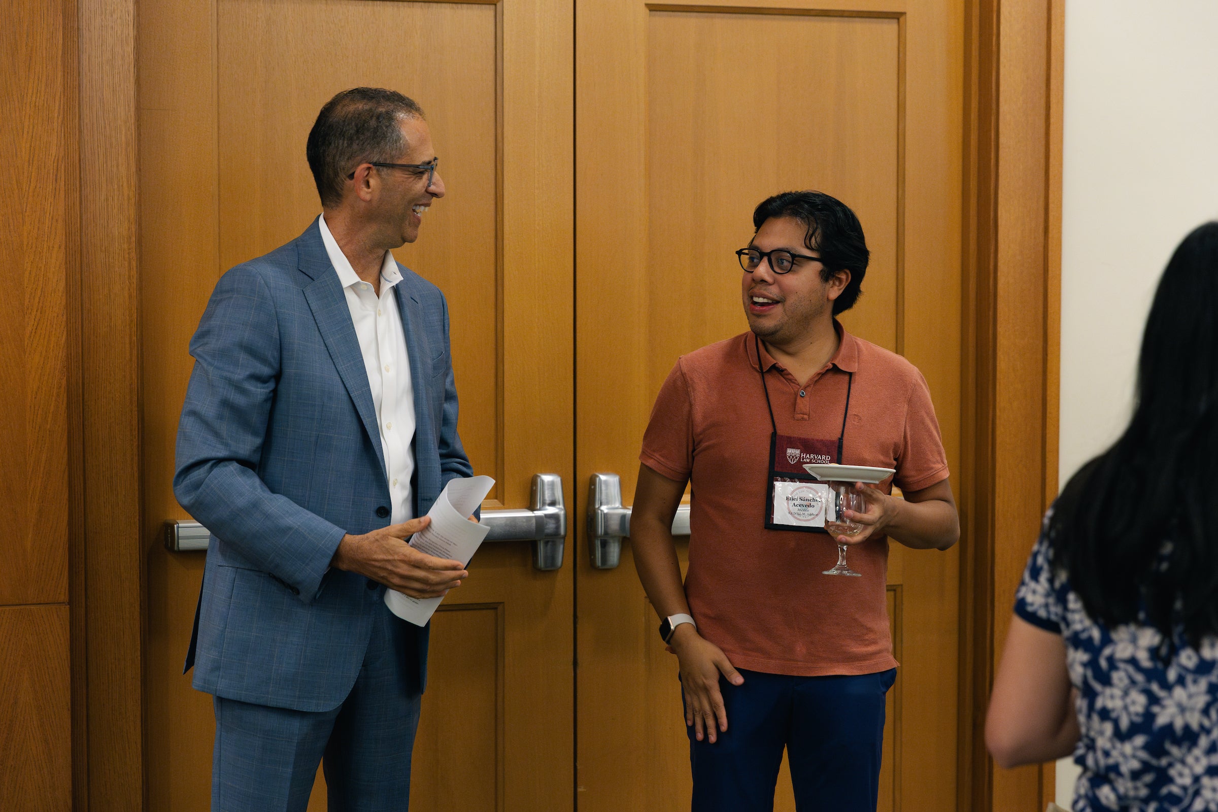 Dean Goldberg talking with a student.