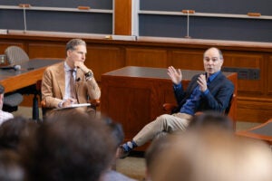 Richard Primus speaking as Noah Feldman and students listen.