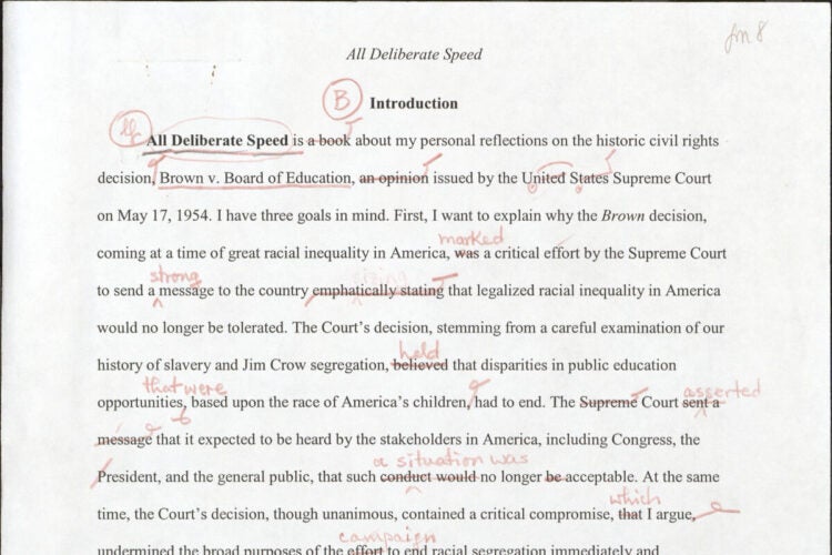 Page of printed text with handwritten copy edit marks.