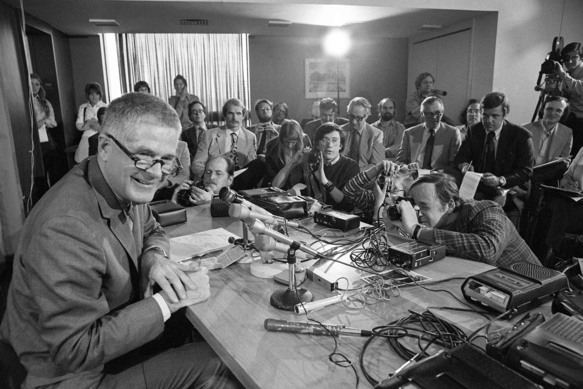 Archibald Cox taking questions from the press at Harvard in 1973.