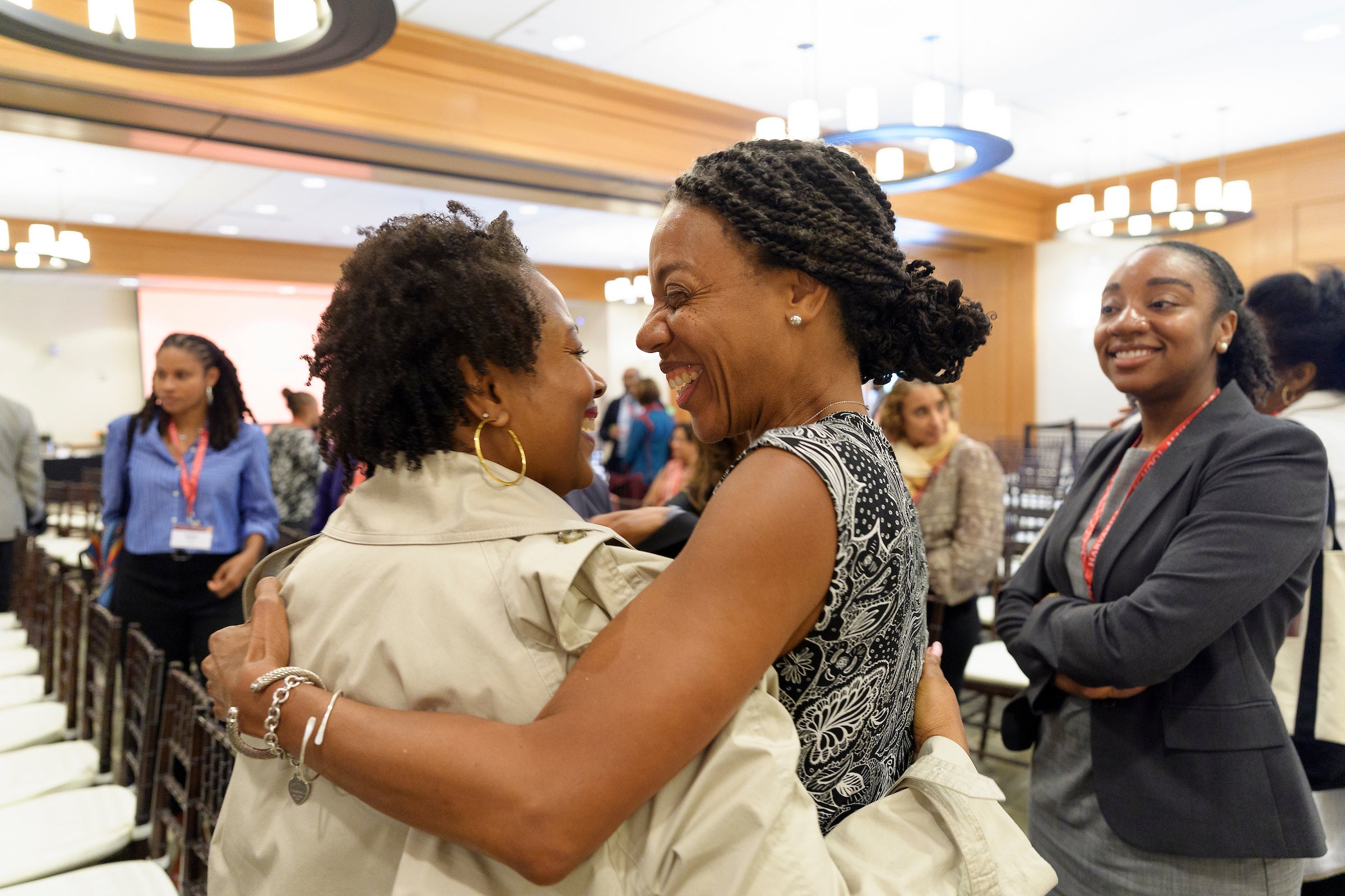 Two women hugging.