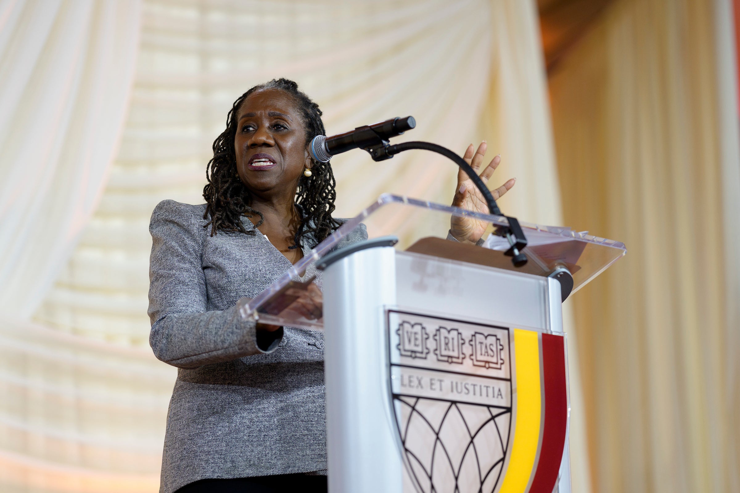 Sherrilyn Ifill speaking at a podium.