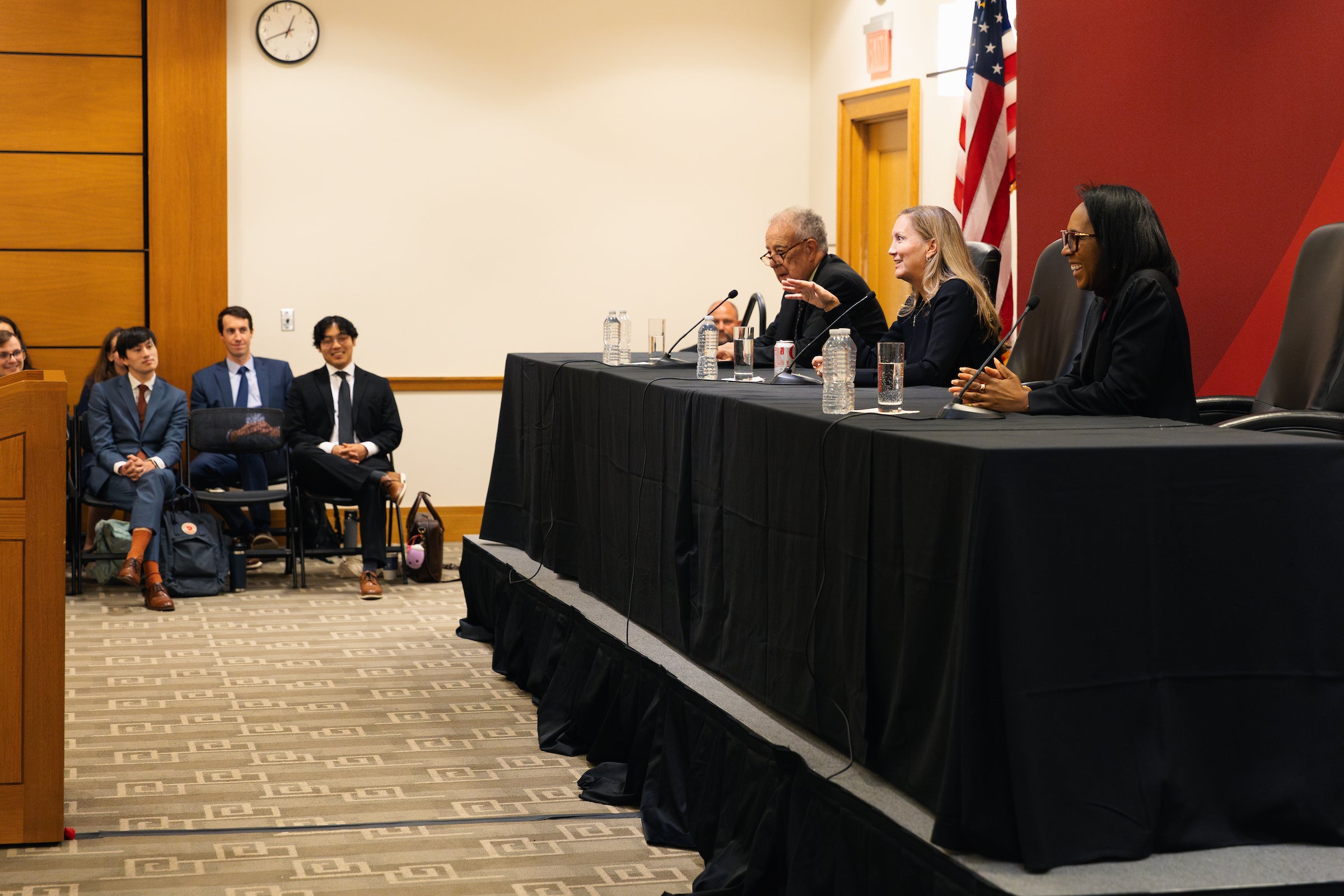 Circuit court clerks observe the judges during the question and answer session.