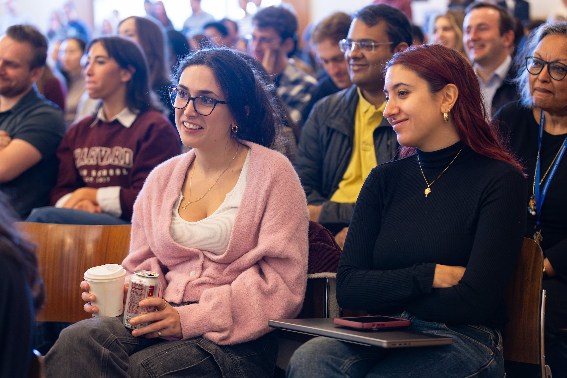 Audience members engaged in the discussion.