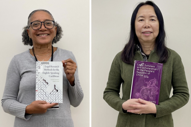 Yasmin Morais and Nongji Zhang holding books they authored.