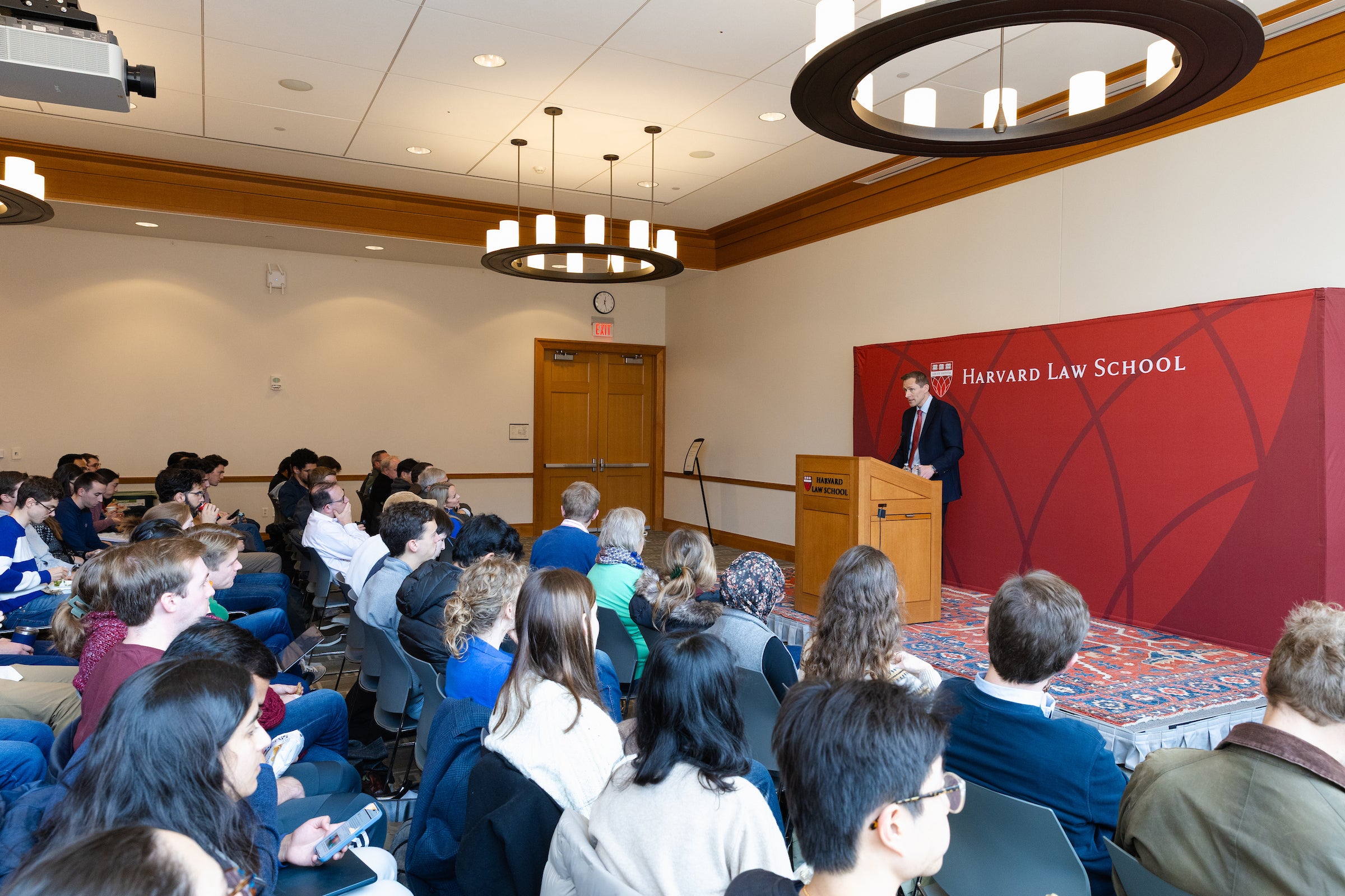 Richard Ekins speaking to an audience of many.