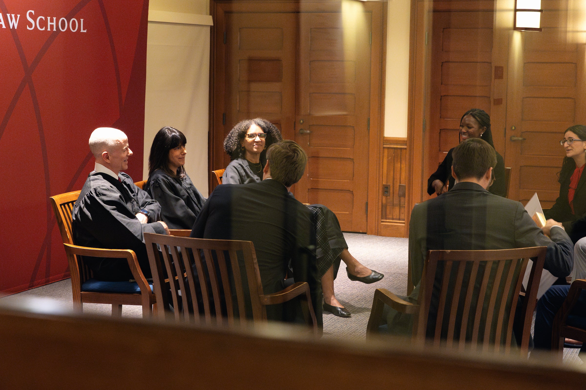 A look through the door of the Morgan Courtroom as judges meet with the teams who participated in Ames.
