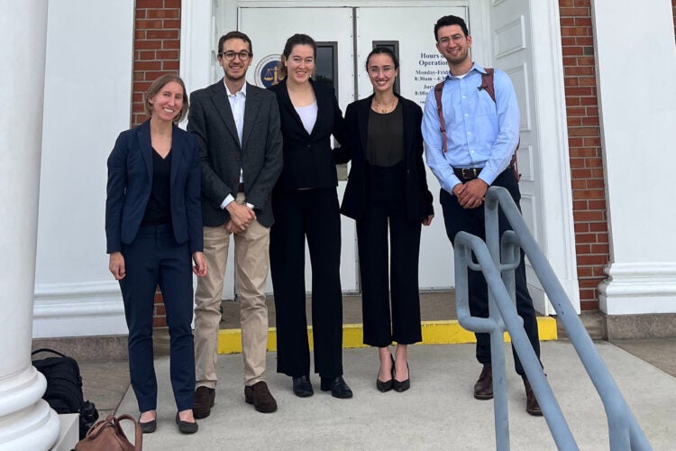 Alexa Rosenbloom with four students.