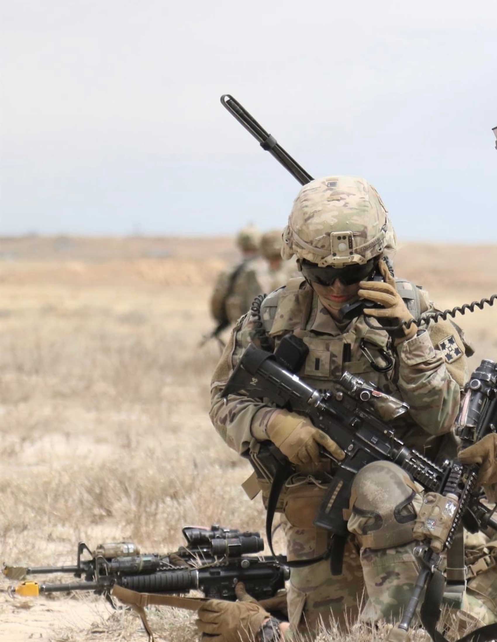 Woman in military uniform training,