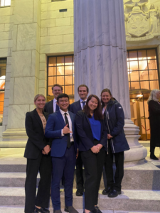 A group of students stands outside the NY Court of Appeals