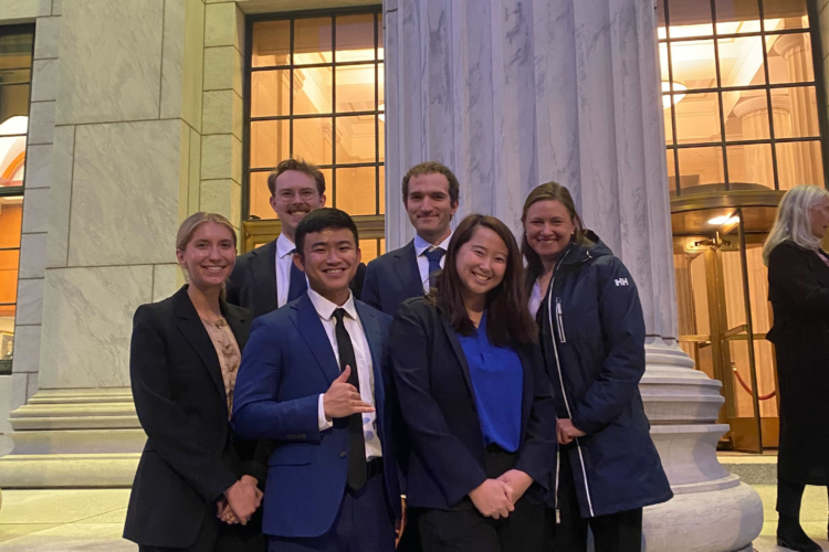A group of students stands outside the NY Court of Appeals