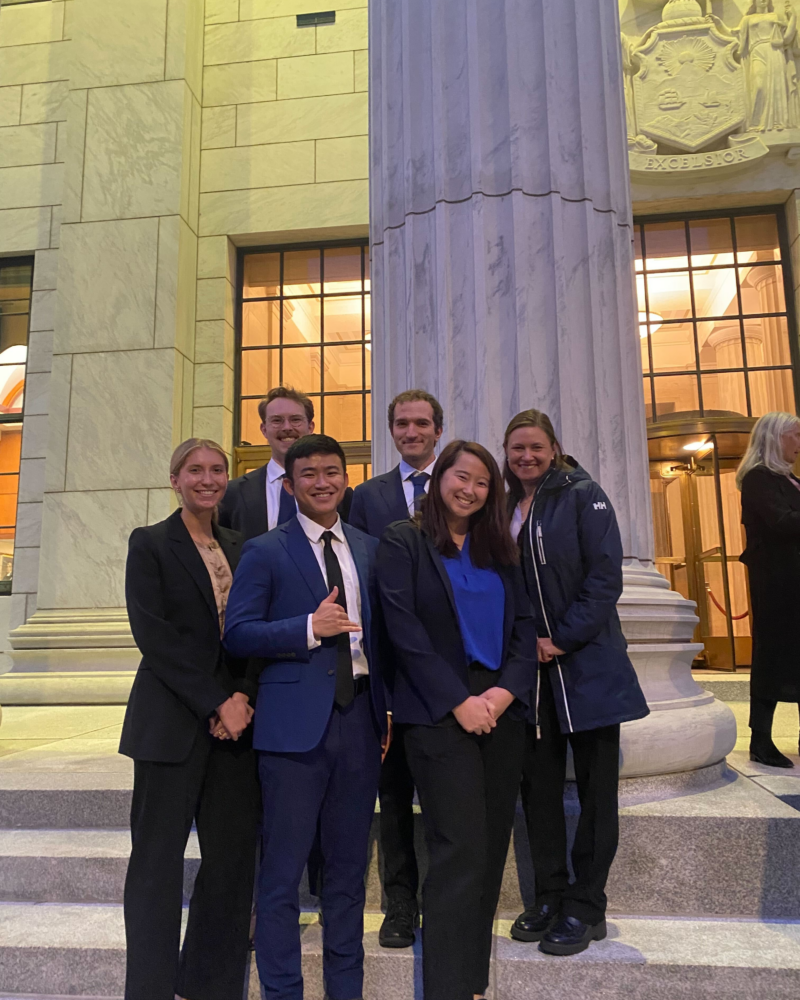 A group of students stands outside the NY Court of Appeals