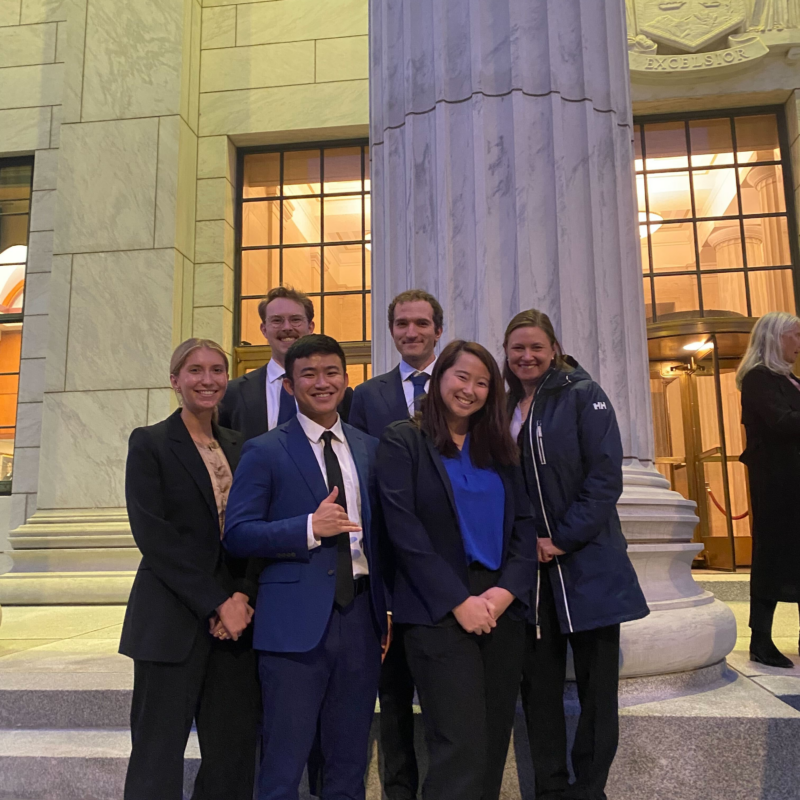 A group of students stands outside the NY Court of Appeals