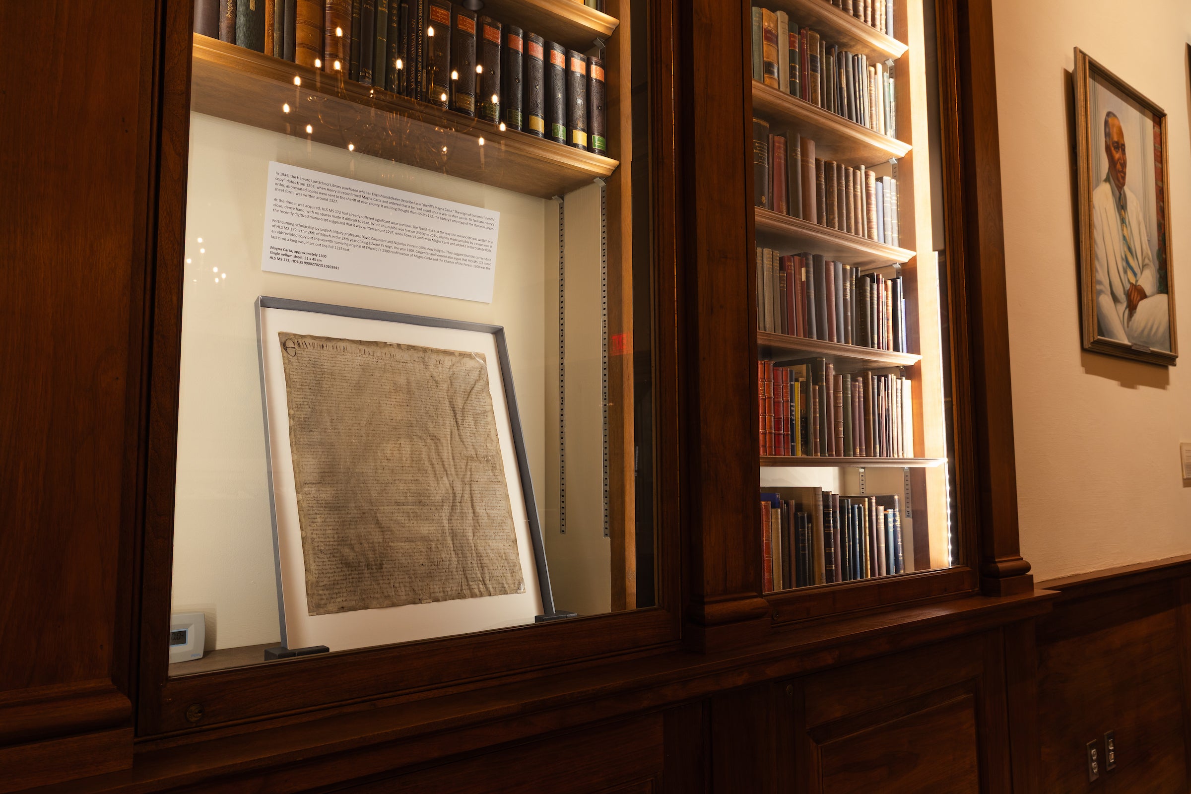 The Magna Carta on display in a case in the Langdell Library.