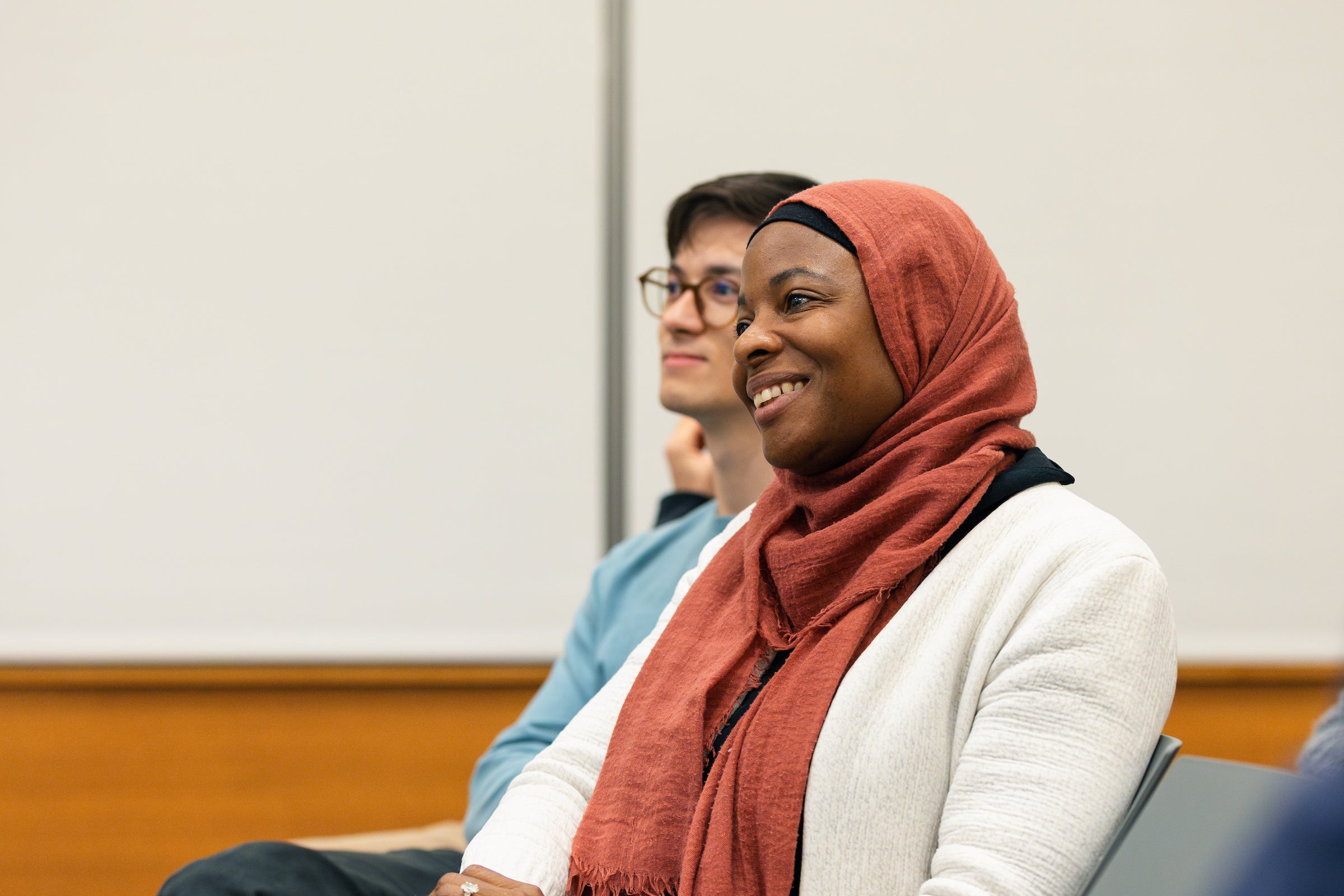 Professor Intisar A. Rabb in the audience of a lecture.