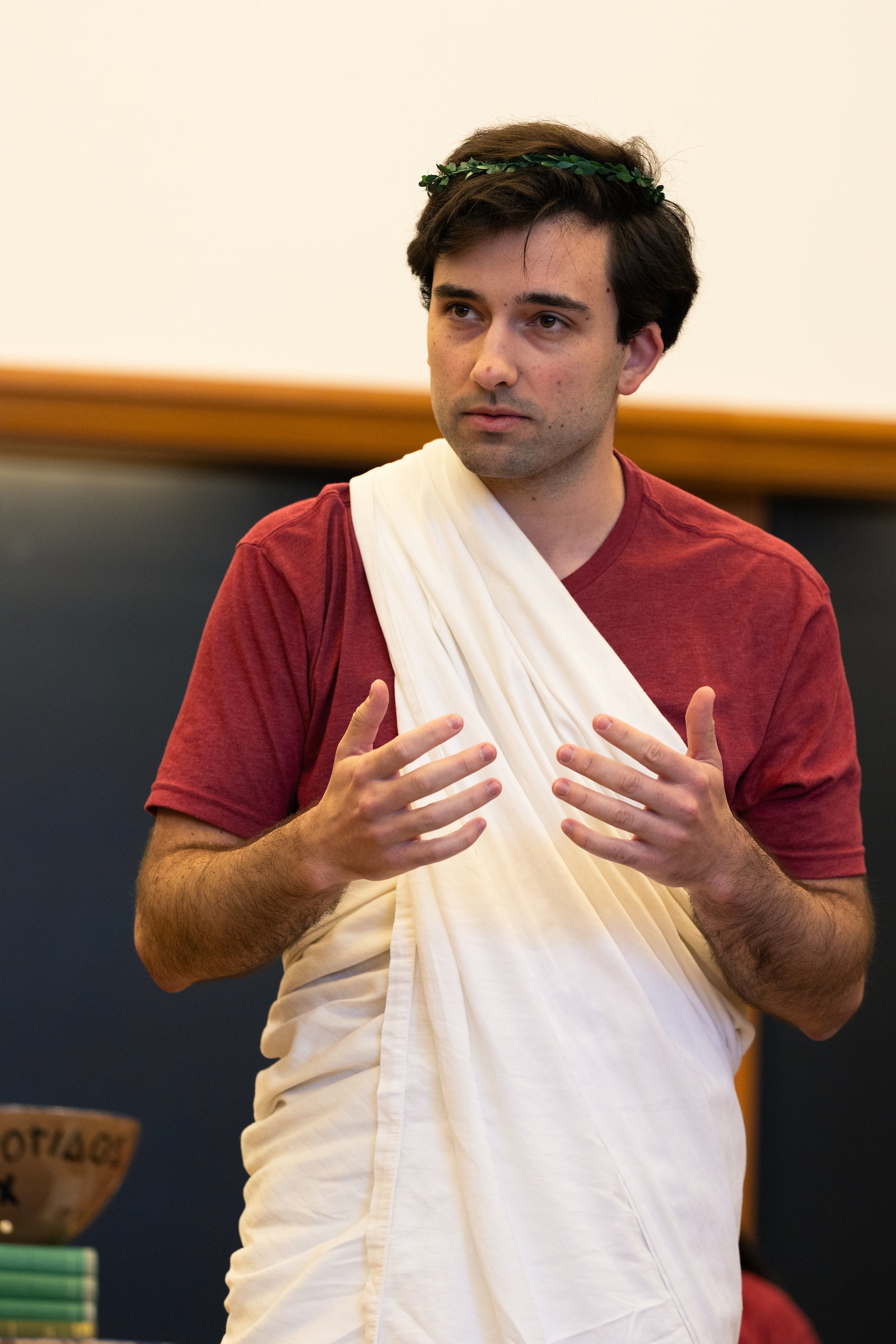 A student in a toga making their case.