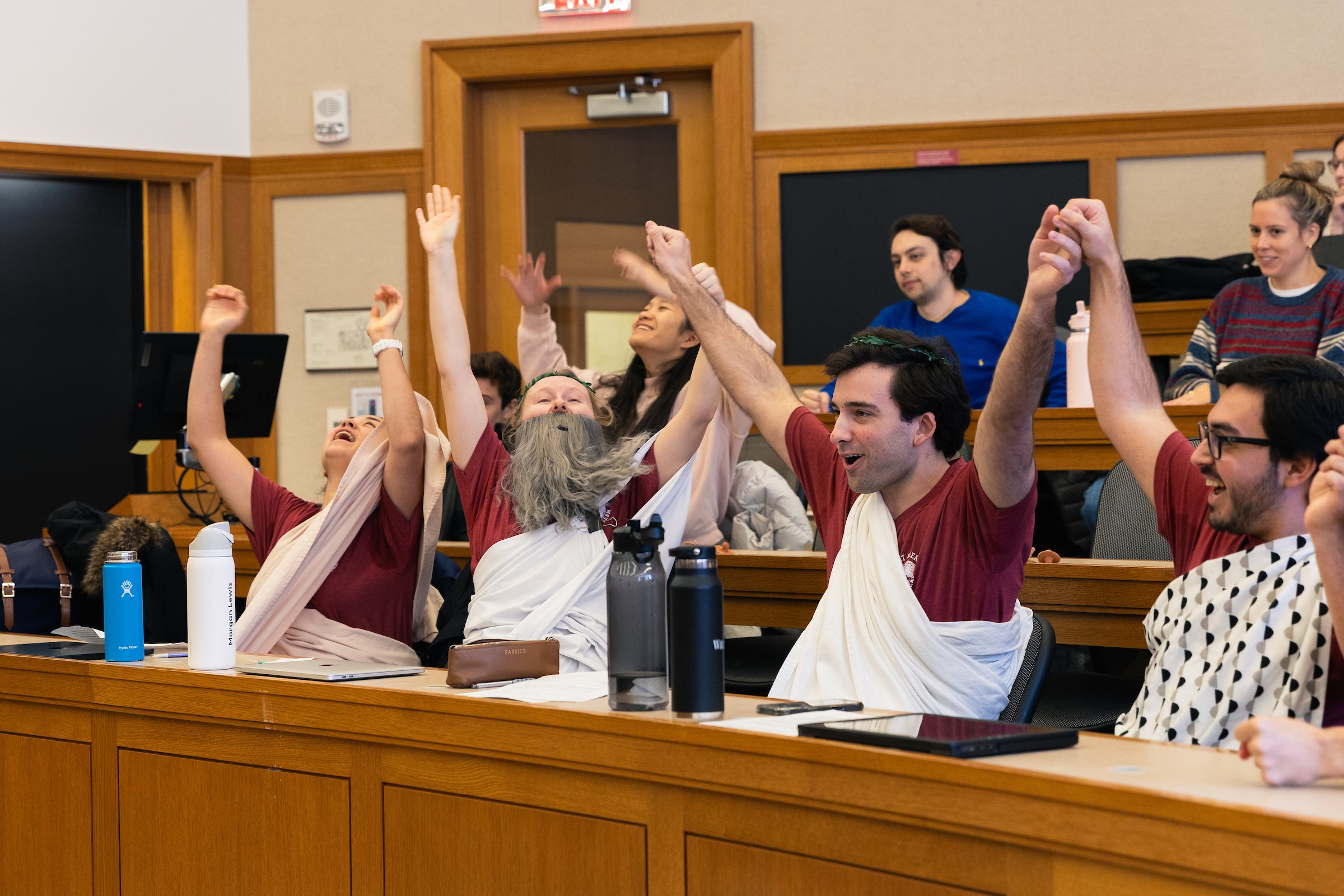 Socrates and his defense team celebrate his acquittal.