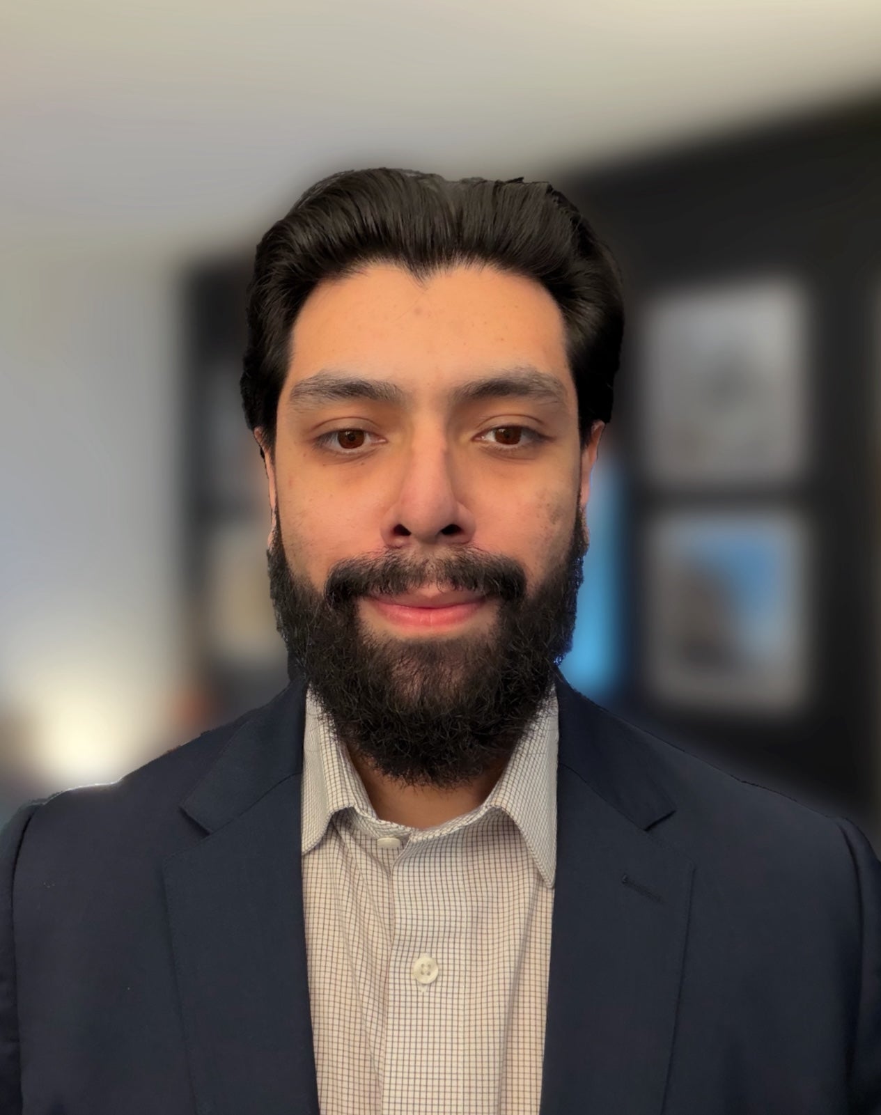 Headshot of Jose Alcocer.