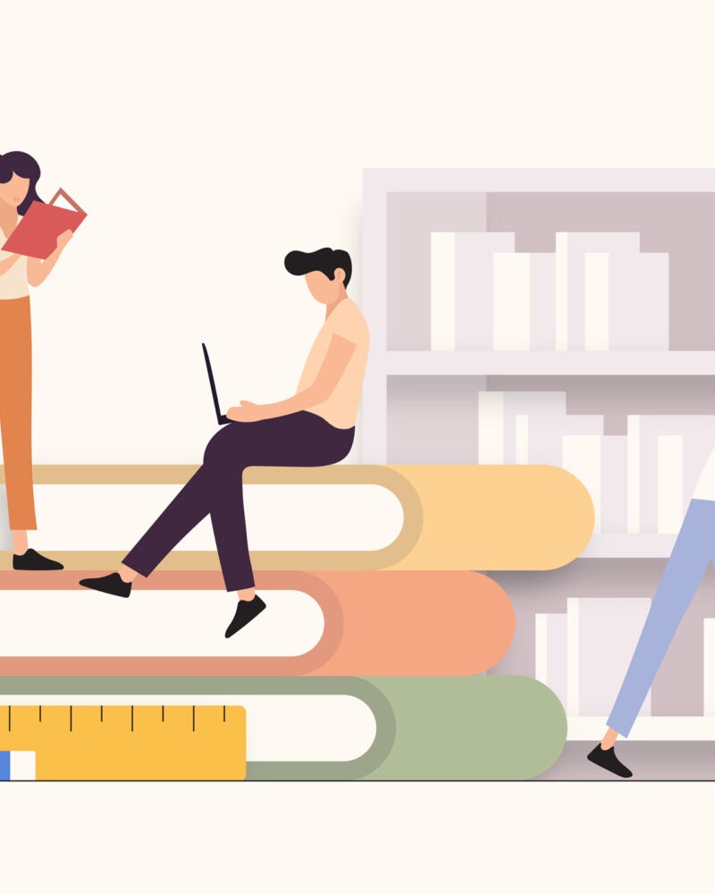 Illustration of students sitting and standing on large books.