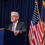 Jerome Powell speaks at a press conference.