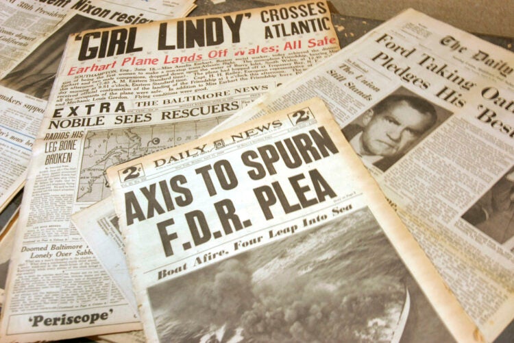 Array of old newspapers.