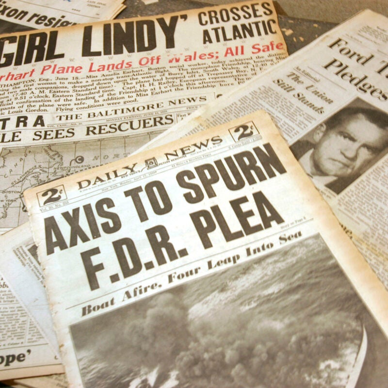 Array of old newspapers.