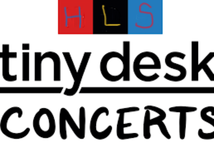Words tiny desk on top of a desk outline with concert beneath