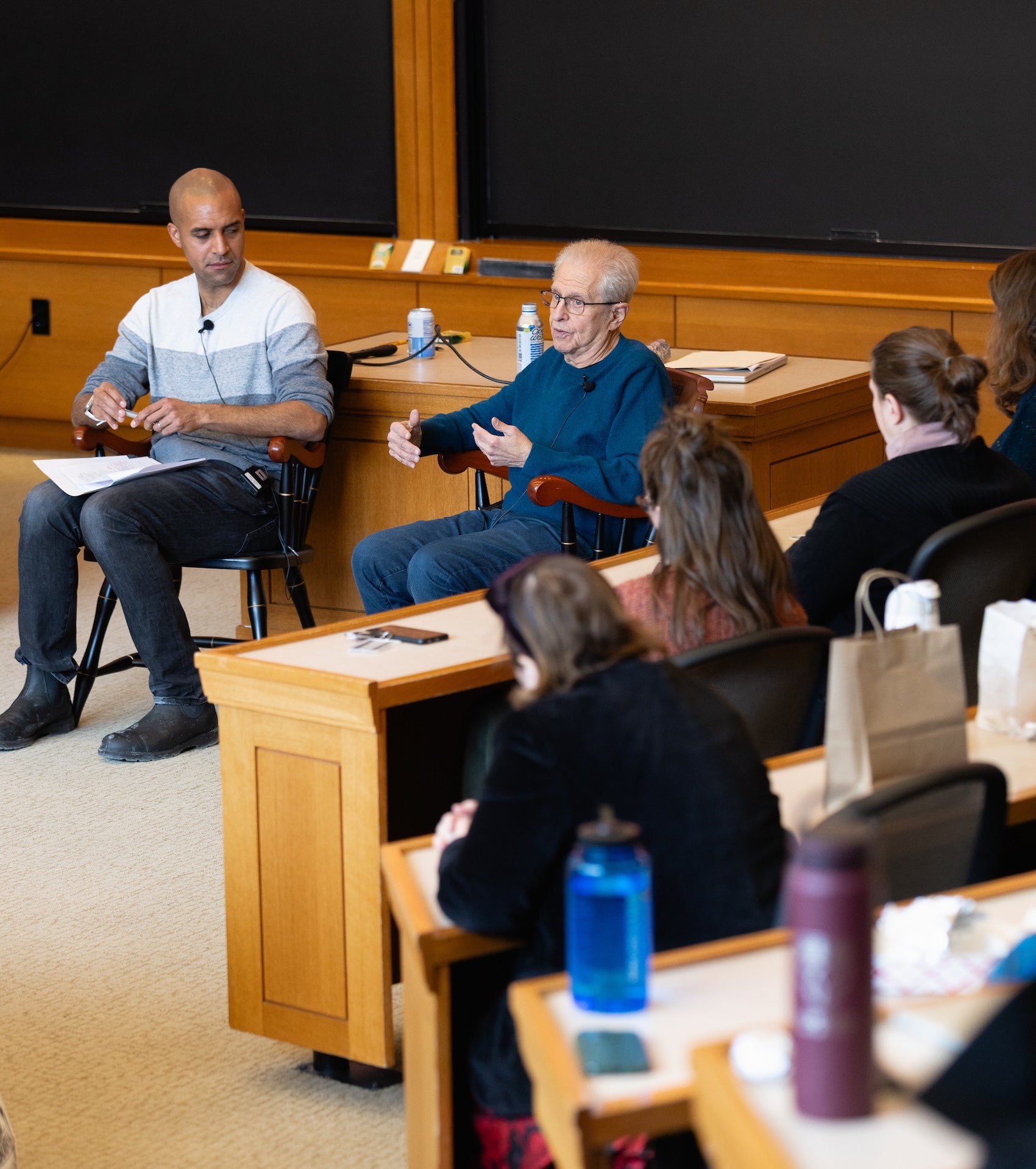 Nikolas Bowie and Laurence Tribe in front of a class.