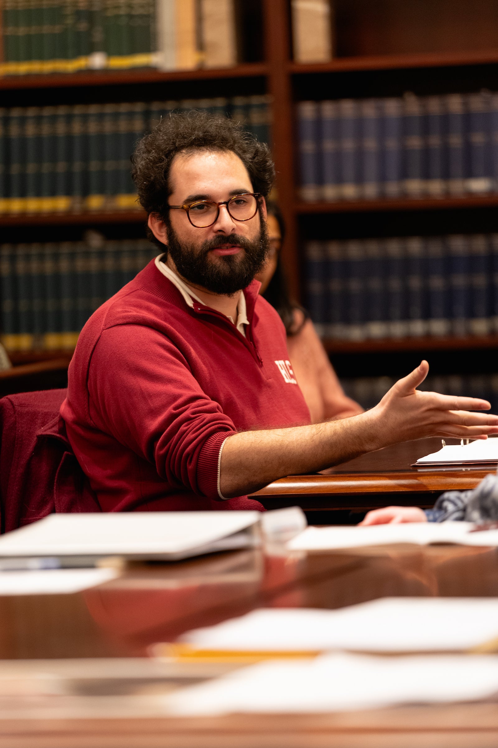 A student participating in a discussion.