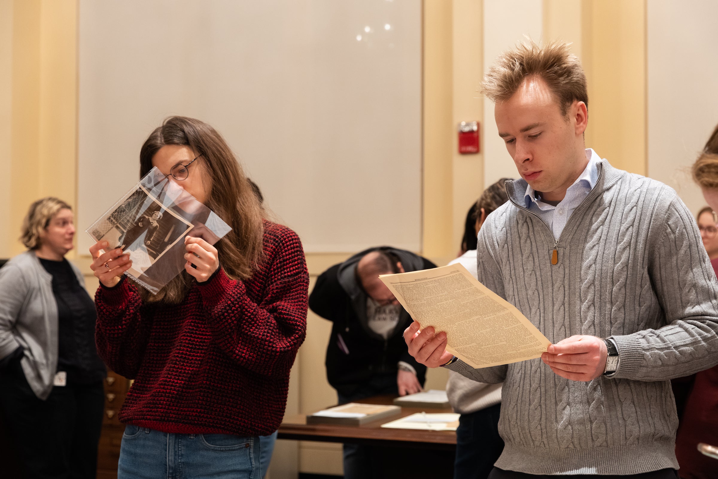 Students examine case materials from the Historical & Special Collections.