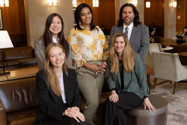 Harvard Legal Aid Bureau staff and students with Family Matters 1st executive director Tatiana Rodriguez.